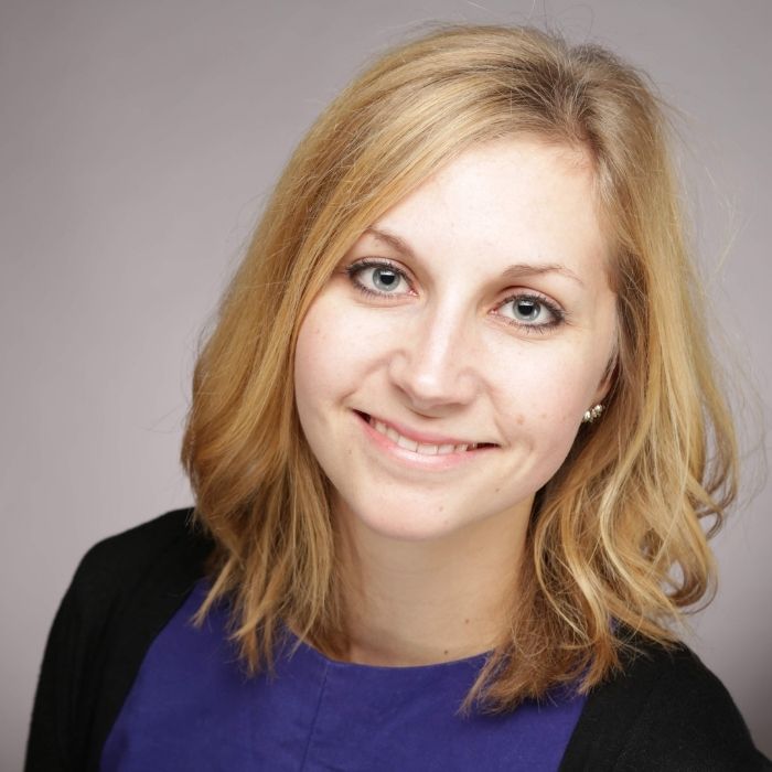 Caucasian woman smiling at the camera